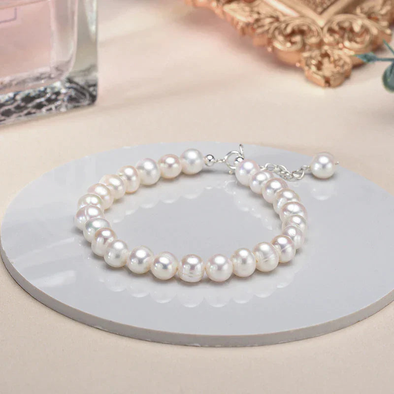 Exquisite women's freshwater pearl and sterling silver bracelet. Elegant, timeless, delicate fine jewelry.
