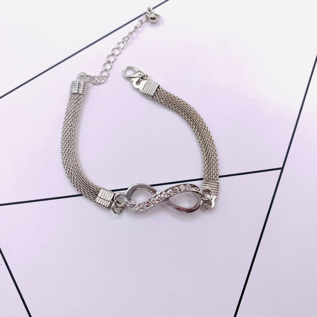 Gleaming sterling silver infinity bracelet for women, an elegant and adjustable jewelry accessory.