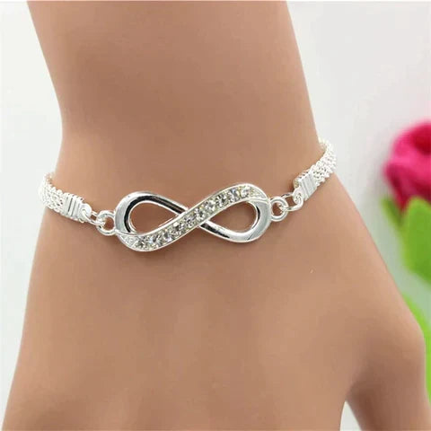Shimmering sterling silver infinity bracelet for women, an elegant and timeless jewelry piece.