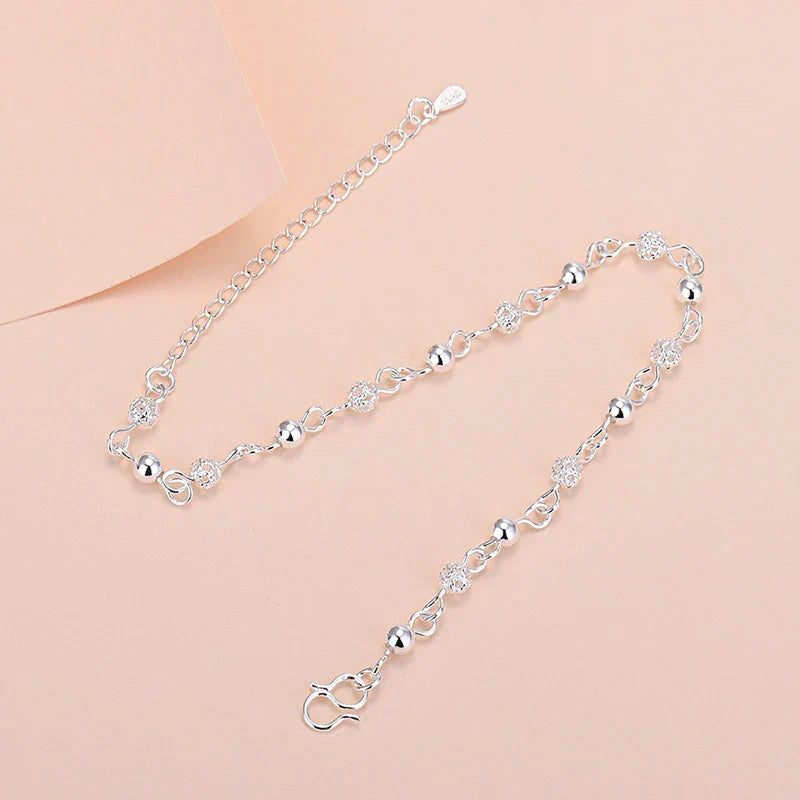Adjustable silver star bracelet, elegant women's jewelry featuring a celestial star design.