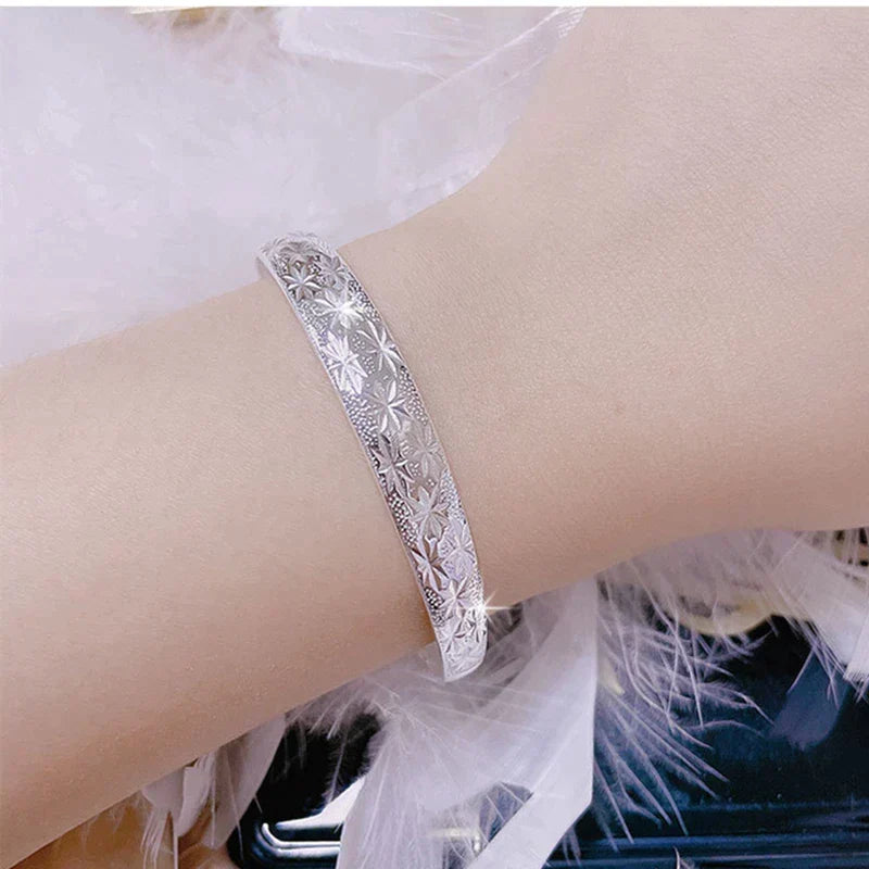 Women's delicate silver bracelet with a beautiful star charm, sterling silver, adjustable.