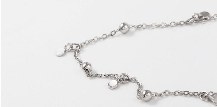 Versatile elegant silver teardrop necklace, women's jewelry perfect for everyday or special occasions.