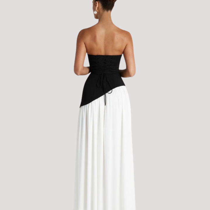 White elegant strapless pleated maxi dress, sophisticated formal evening gown for women.