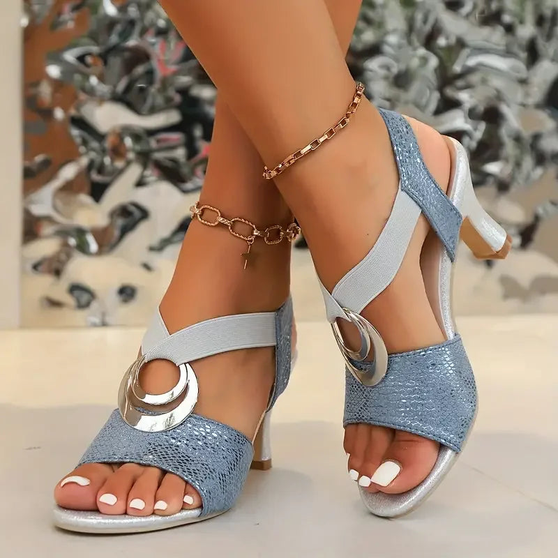 Elegant women's open-toe block heels with slender straps, ensuring all-day comfort for any fashion-forward look.