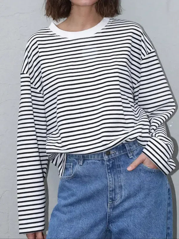 Sophisticated women's striped bell sleeve sweater, perfect for casual chic or elegant everyday fashion.