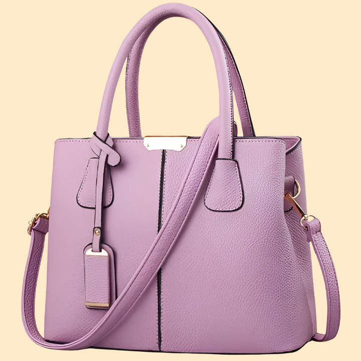 Women's elegant structured satchel handbag in a chic minimalist style, perfect for professional everyday carry.
