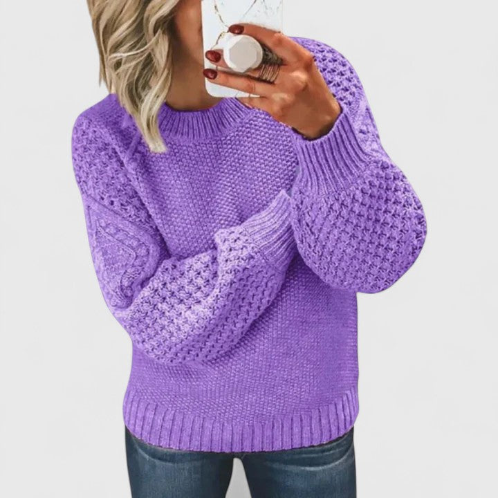 Soft knit women's textured puff sleeve sweater with a mock neck, offering elegant style for fall/winter.