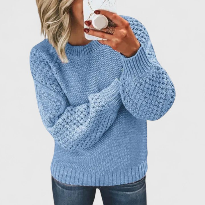 Elegant women's textured puff sleeve sweater, a chic and warm top for winter fashion & fall daytime outfits.