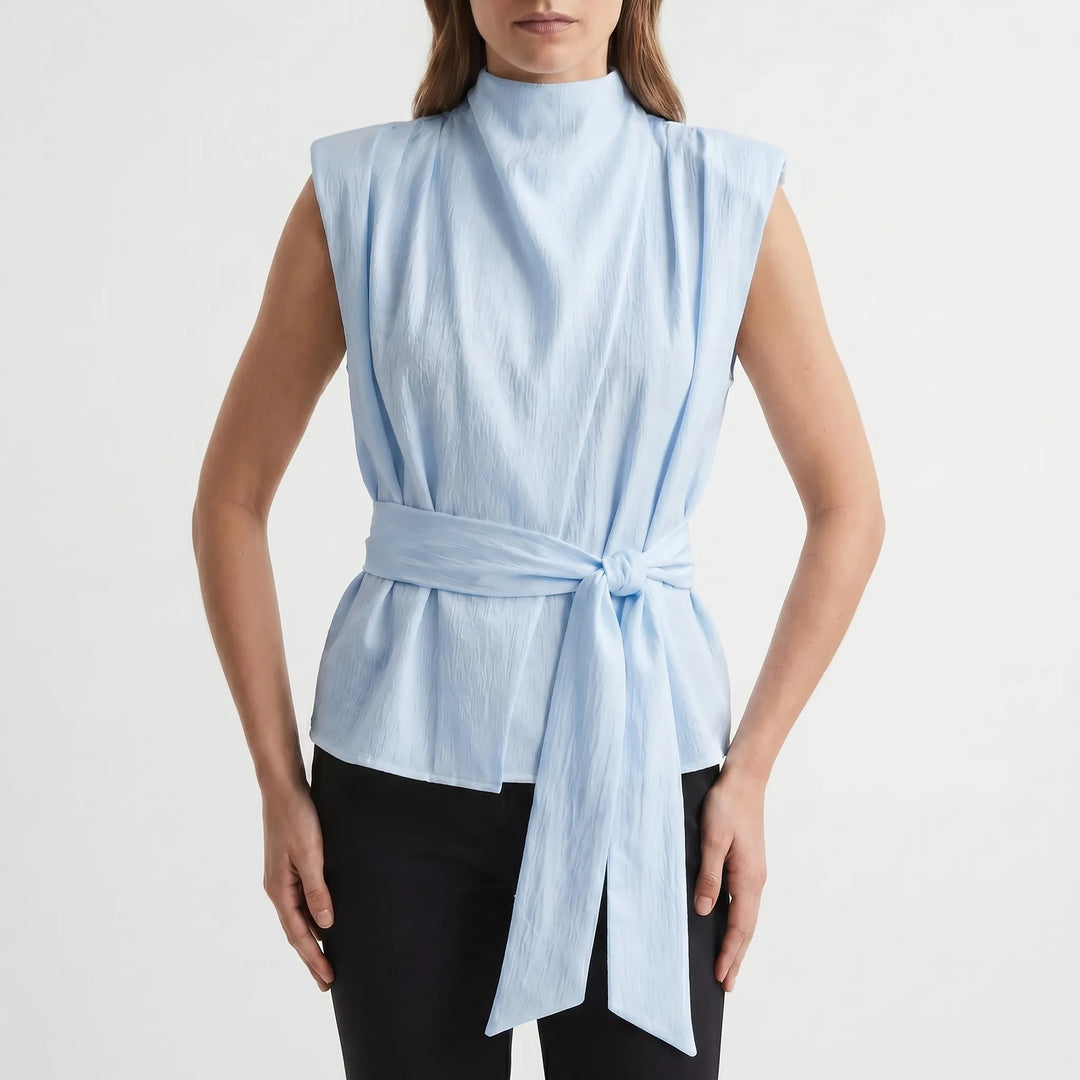Stylish women's sleeveless party top with adjustable tie-waist, ideal for summer evenings.