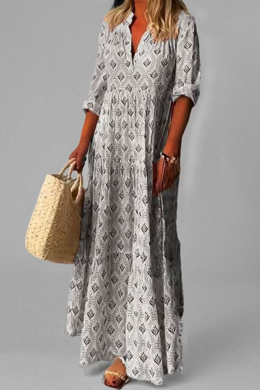 Chic women's tiered maxi dress, a stylish flowy design for elegant summer fashion & events.
