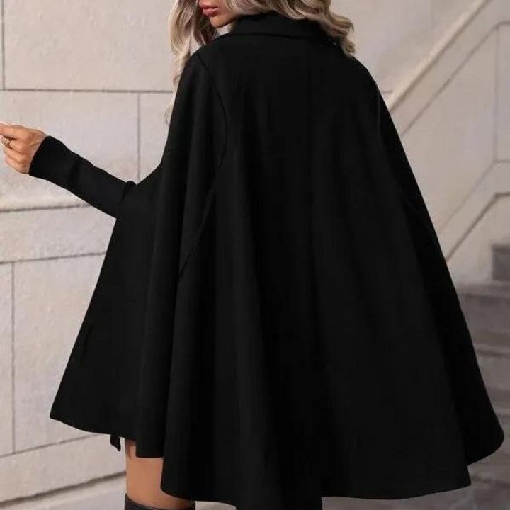 Stylish women's trench poncho, loose fit, ideal for layering. Fashionable fall/spring jacket outerwear.