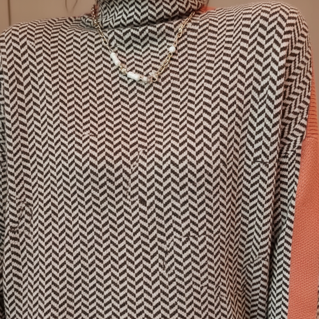 Close-up of women's knitted turtleneck sweater, showing elegant texture and cozy polyester blend fabric