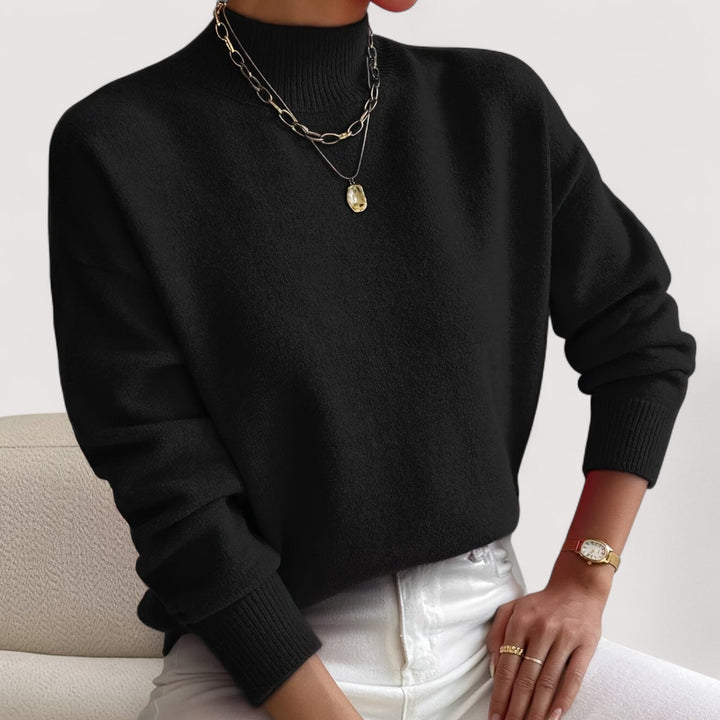 Warm women's turtleneck sweater, a stylish long-sleeve knit for elegant winter outfits. Cozy and chic.