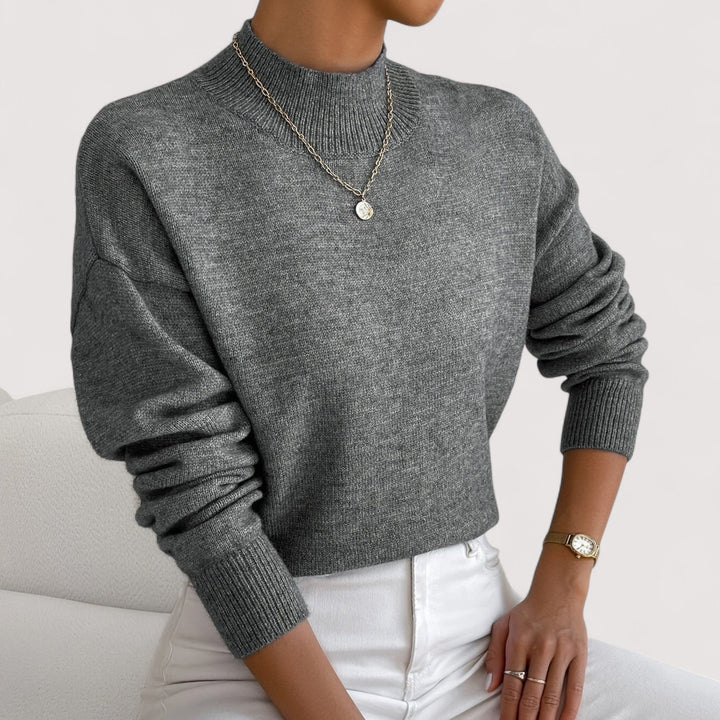 Modern women's turtleneck sweater, a cozy long-sleeve knit for everyday elegant winter wear.