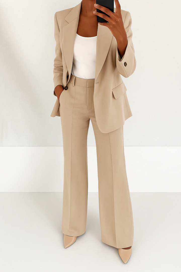 Stylish women's tailored blazer paired with comfortable wide-leg pants, a sophisticated two-piece suit.