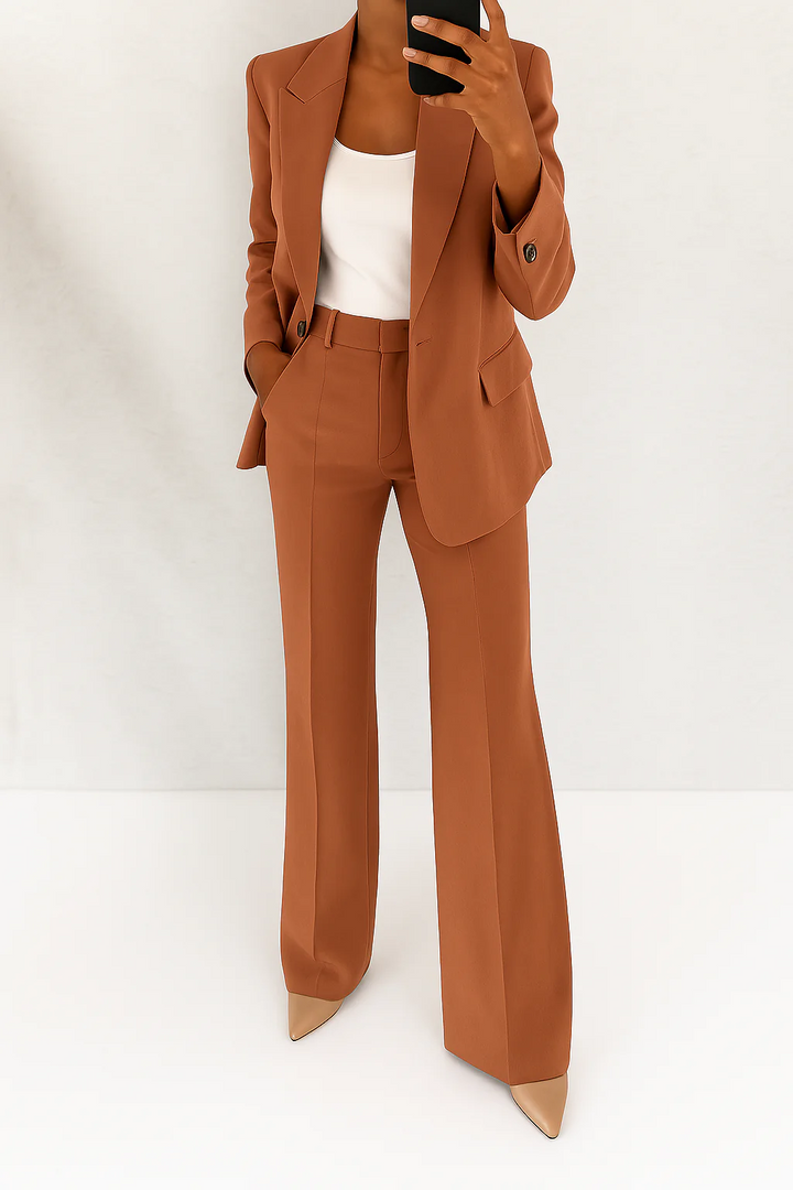 Elegant women's office wear suit set featuring a classic blazer and fashionable wide-leg pants for business.