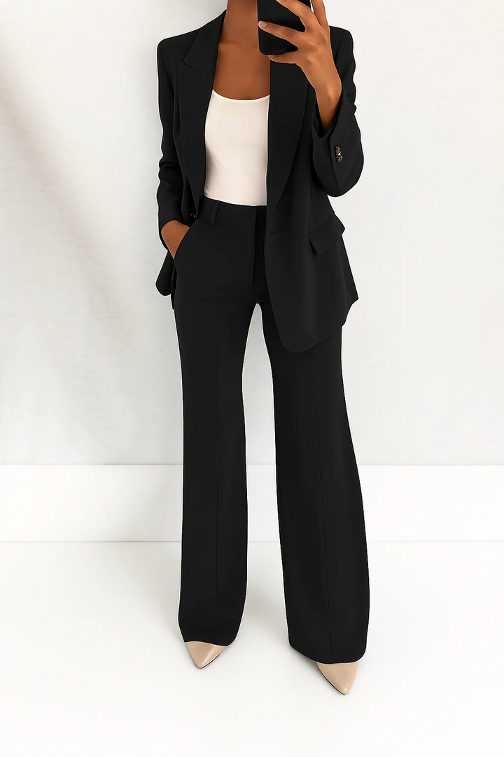 Complete women's suit set with a structured blazer and flowing wide-leg pants, ideal for formal occasions.