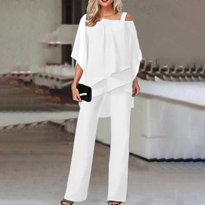 Chic women's two-piece set: cold shoulder top and long pants. Ideal for office, parties, or everyday elegance.