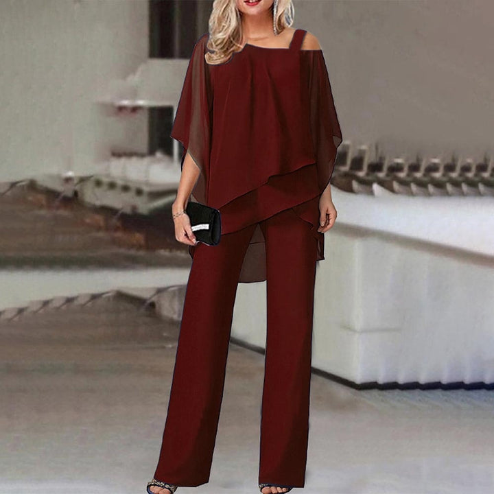 Sophisticated women's cold shoulder long pants set; an elegant two-piece outfit for business or evening wear.