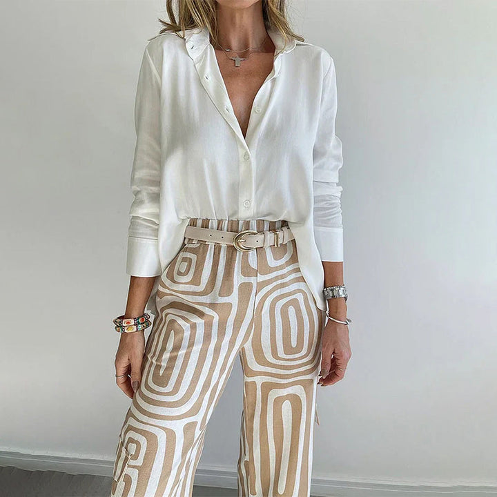 Gray women's two-piece set: elegant flowing top & patterned trousers for a sophisticated, casual chic look.