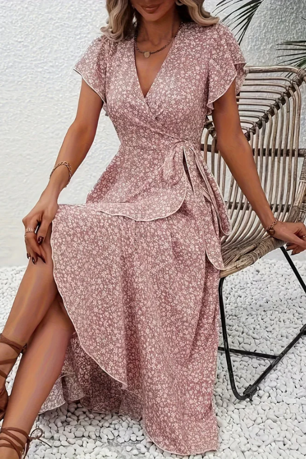 Women's V-neck floral summer dress, lightweight fabric, ideal for outdoor events.