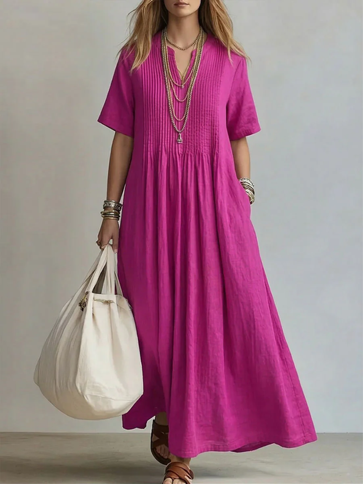 Flattering women's elegant V-neck midi dress. Flowy design, vibrant colors for summer events & comfortable wear.