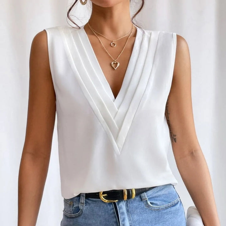 Stylish ladies' sleeveless V-neck top, ideal for summer fashion and versatile office attire.