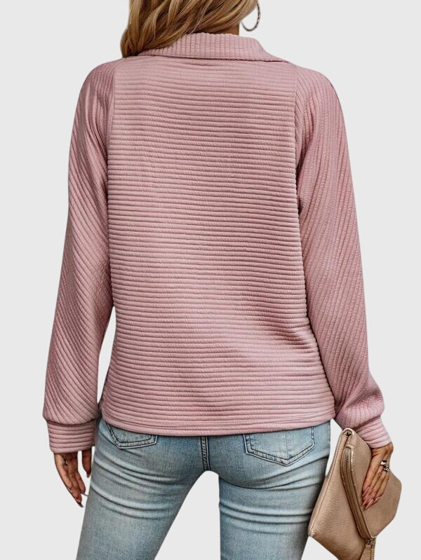 Stylish women's pullover sweater with an elegant V-neck and functional zipper. Versatile for daily wear & layering.