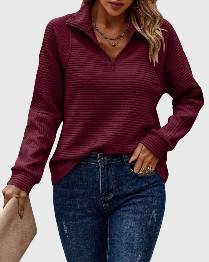 Elegant women's V-neck zipper sweater, ideal for versatile styling. Perfect casual fashion & comfortable layering.