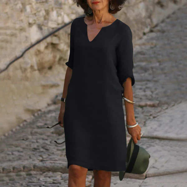 Feminine V-neck 3/4 sleeve dress for women, comfortable loose fit and flattering for all body types.