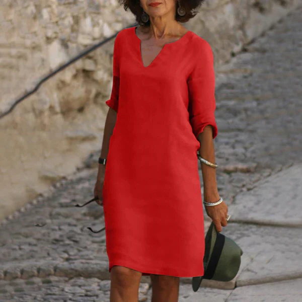 Stylish women's black V-neck midi dress with comfortable 3/4 sleeves, perfect for day to evening.