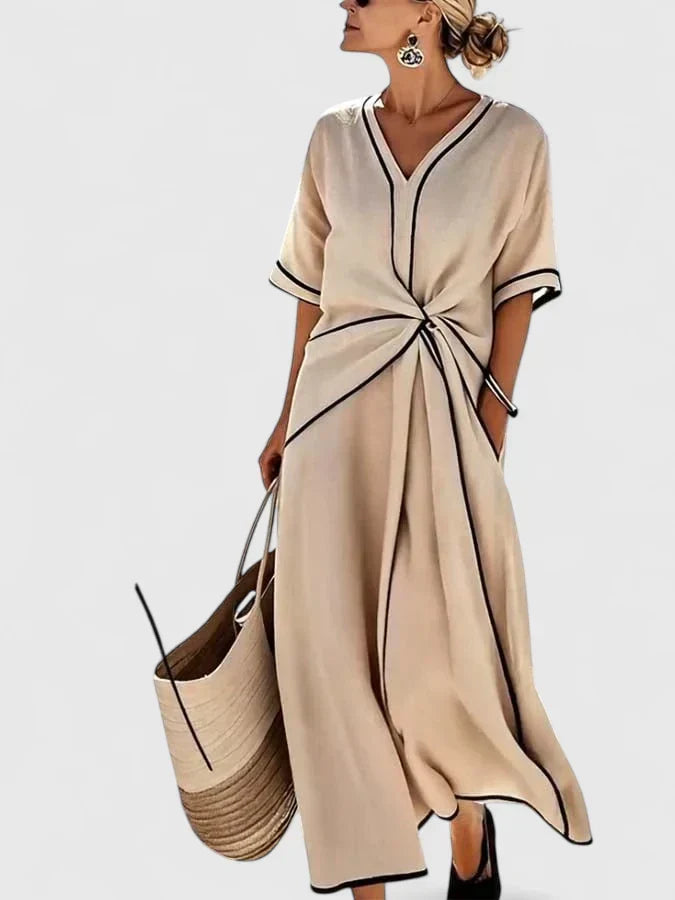 Women's elegant vertical stripe midi summer dress, lightweight and flowy for effortless warm-weather style.