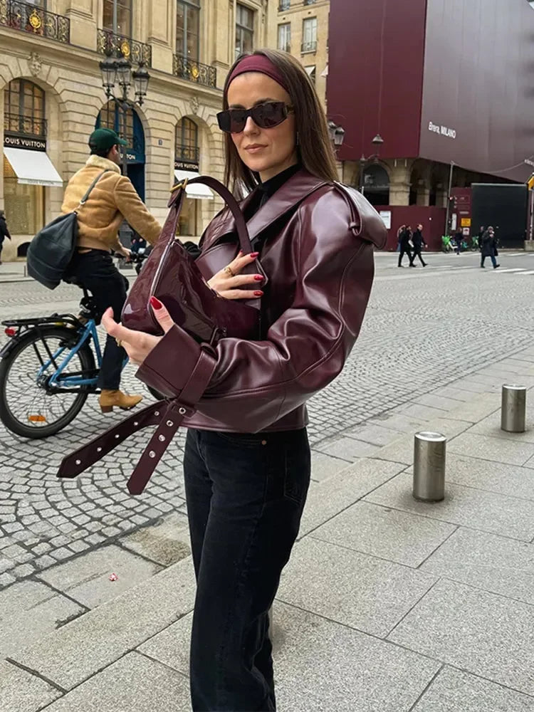 Fashionable vintage women's jacket. Elegant outerwear piece for layering & sophisticated seasonal apparel.