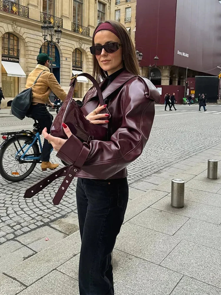 Fashionable vintage women's jacket. Elegant outerwear piece for layering & sophisticated seasonal apparel.