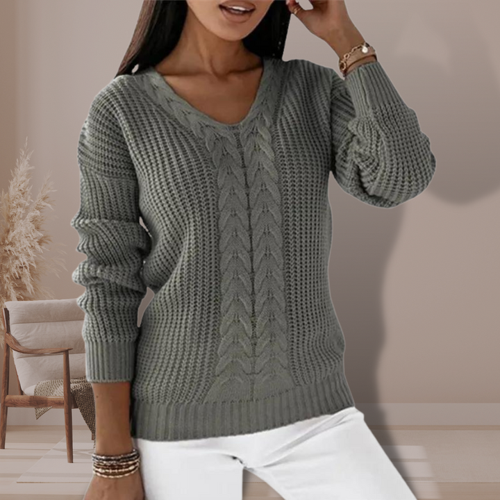 Women's elegant warm pullover sweater, perfect for cozy winter style and comfort. Long sleeve knit top.