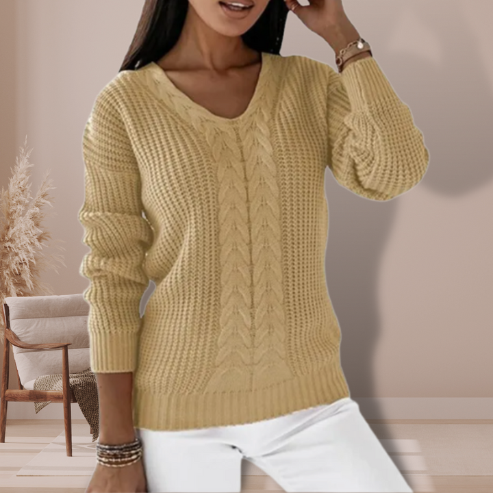 Stylish women's warm pullover sweater for elegant winter fashion. Cozy and comfortable long sleeve top.