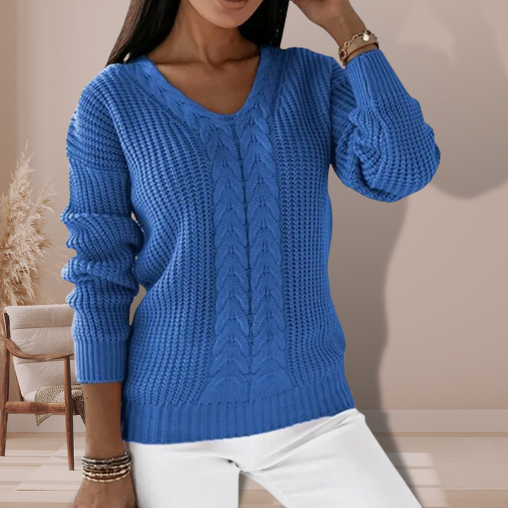 Cozy women's warm pullover sweater, ideal for chilly winter days. Elegant and comfortable long sleeve top.