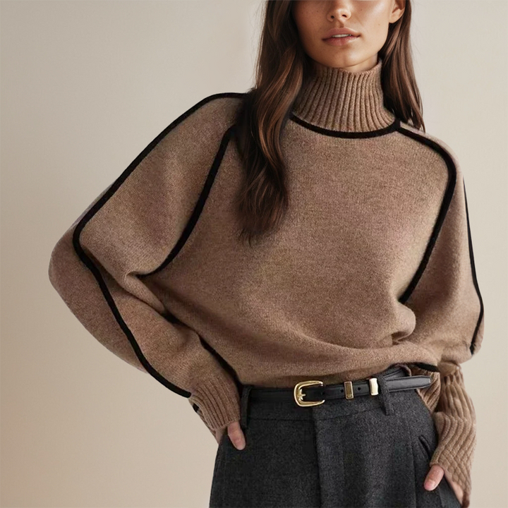 Women's elegant warm turtleneck sweater in a cozy knit, perfect for winter fashion and sophisticated everyday wear.