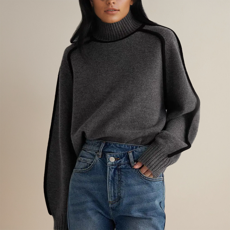 Sophisticated women's warm turtleneck sweater with long sleeves, offering cozy comfort and elegant winter style.