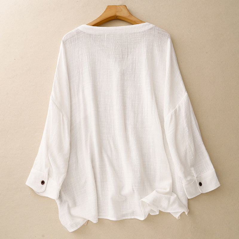Chic women's button-up top, an elegant & versatile spring shirt with a relaxed fit for sophisticated casual wear.