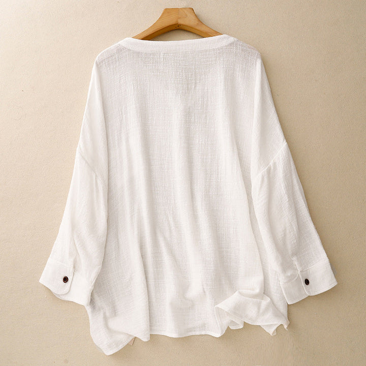 Chic women's button-up top, an elegant & versatile spring shirt with a relaxed fit for sophisticated casual wear.