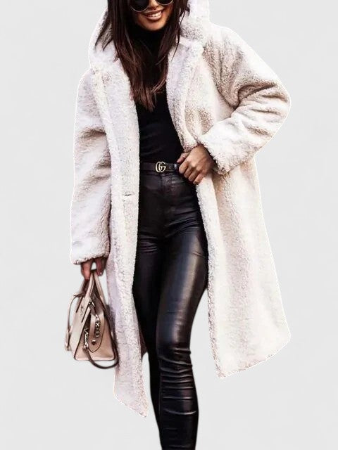 Stylish women's winter jacket offering warmth and elegant fashion. Perfect cozy wear for cold weather.