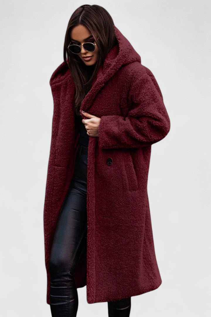 Cozy and warm women's winter jacket with an elegant design. Stylish outerwear for cold weather comfort.