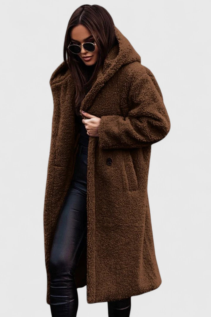 Sophisticated women's winter jacket, warm, elegant, and stylish. Chic outerwear for cold weather fashion.