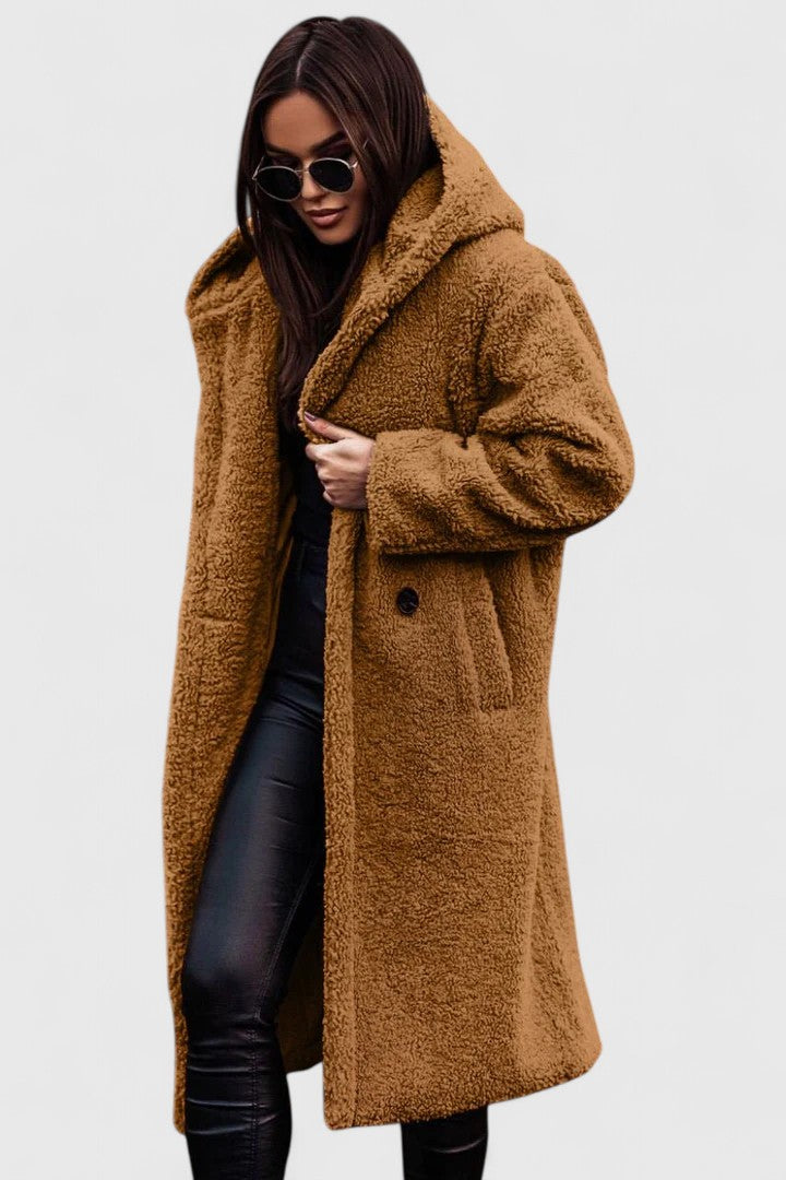 Modern women's elegant winter jacket, warm and chic. Stylish outerwear for comfortable cold weather fashion.