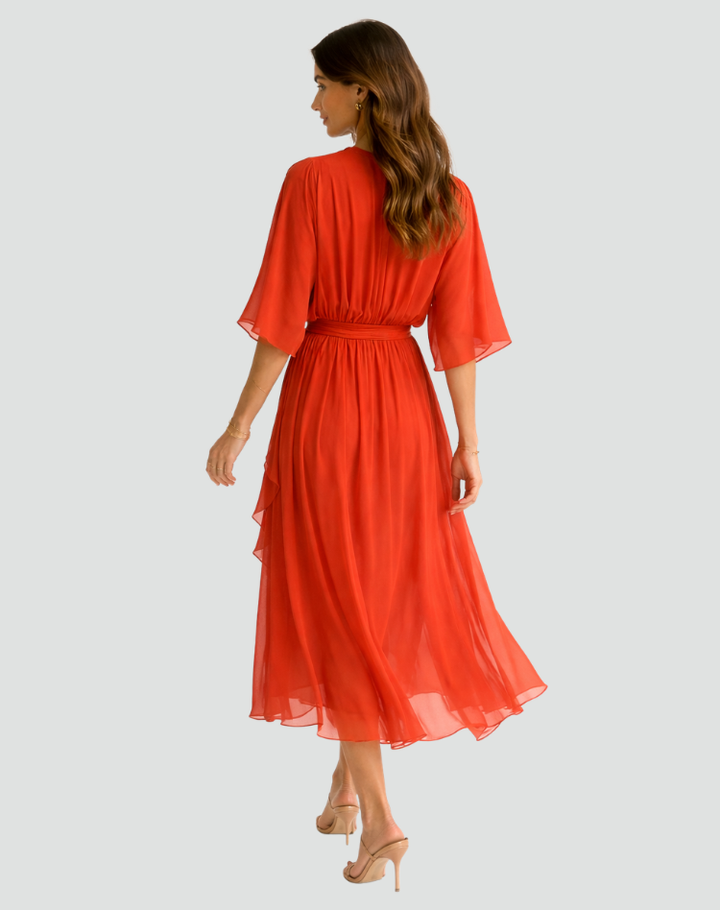 Women's elegant wrap midi dress with tie waist. A versatile V-neck party dress for summer.