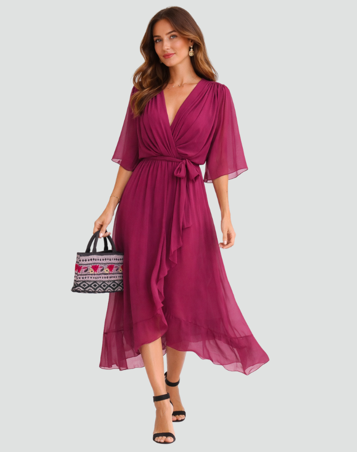 Stylish summer women's wrap midi dress. Elegant design with a tie waist for a flattering fit.