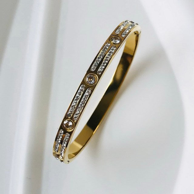 Delicate women's zircon inlay bracelet, adding sparkle to any outfit.