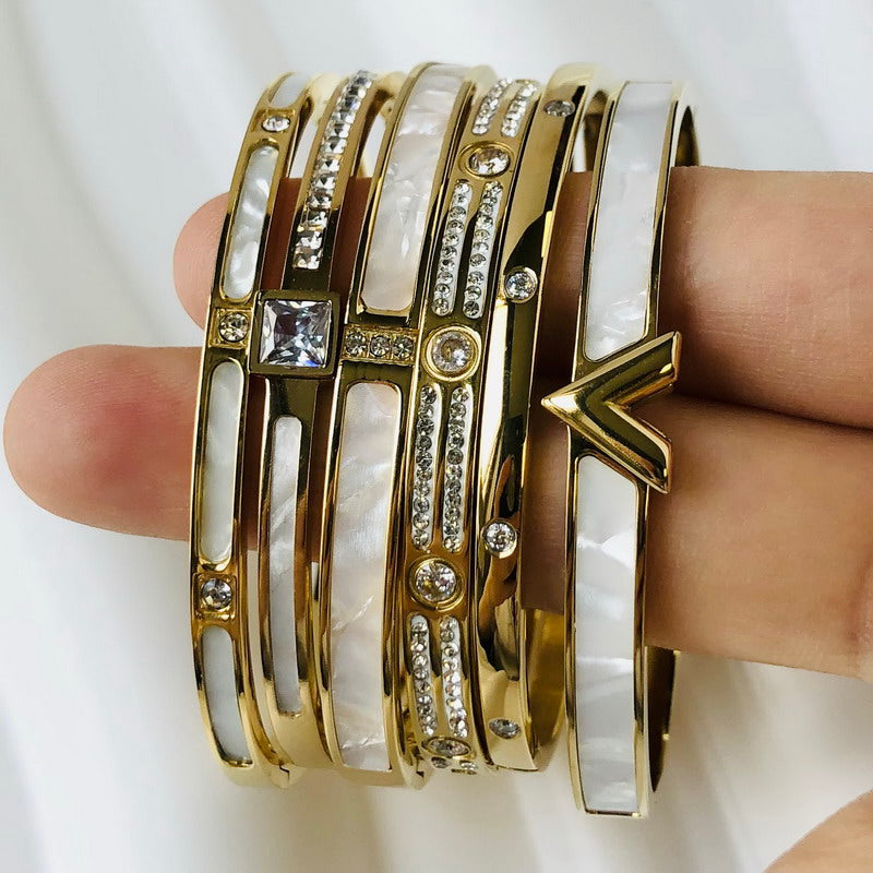 Contemporary women's zircon inlay bangle bracelet, elegant and durable.