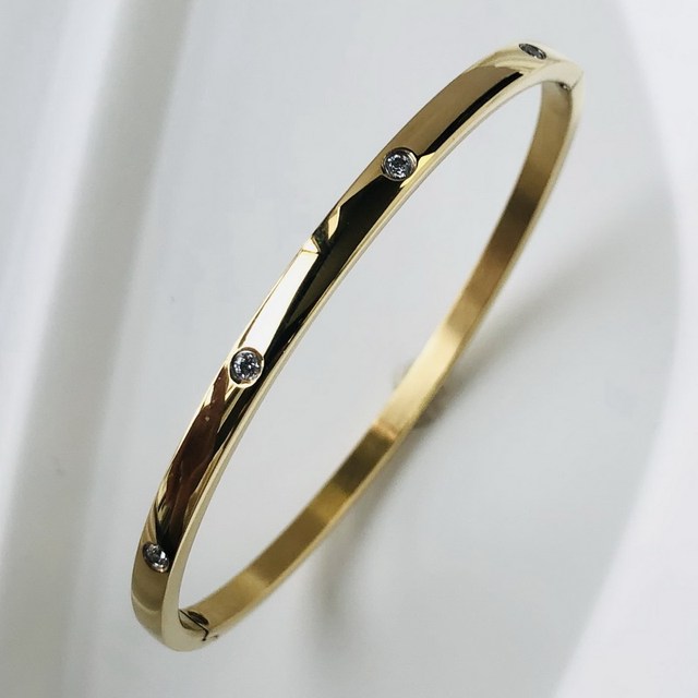 Sparkling zircon inlay bangle for women, an elegant waterproof accessory.